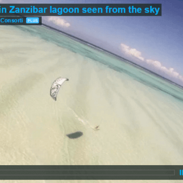 [:en]Kitesurf in Zanzibar lagoon seen from the sky[:]